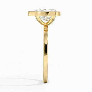 1.50 Ct Pear Cut Moissanite Bezel Set Engagement Ring in Yellow Gold