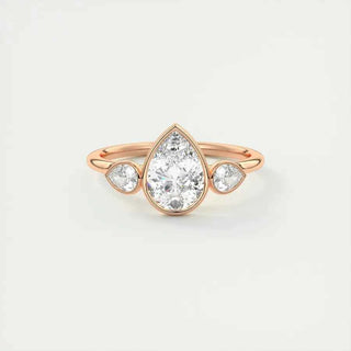 2 Carat Pear Cut Three Stone Bezel Set Moissanite Ring in Rose Gold