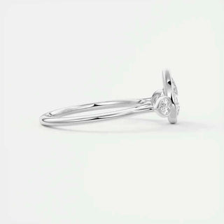 2 Carat Pear Cut Three Stone Bezel Set Moissanite Ring in Rose Gold
