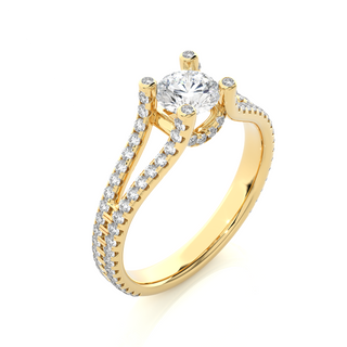 Angled view of 1.50 Carat Moissanite Split Shank Engagement Ring With Accents In Yellow Gold, showcasing the band and setting.