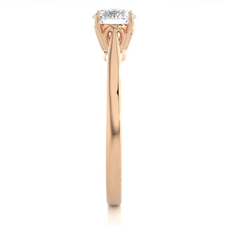 Side profile of 0.75 Carat Round Moissanite Solitaire Engagement Ring in Rose Gold, highlighting the prong setting.