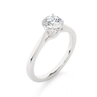 Angled view of 0.75 Carat Round Moissanite Solitaire Engagement Ring in White Gold, showcasing the band and setting.​