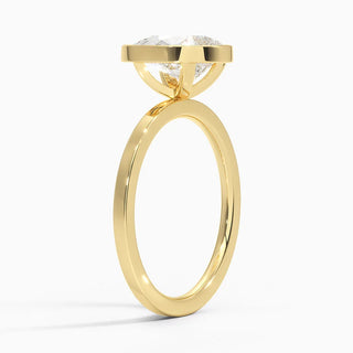 1.50 Ct Pear Cut Moissanite Bezel Set Engagement Ring in Yellow Gold