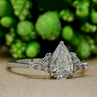 1 Carat Pear Shaped Moissanite Cluster Ring Angle view