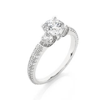 Angled View 1 Ct Round Moissanite Engagement Ring with Accents in White Gold, showcasing the band and setting.