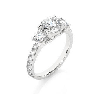 Angled view of 2.50 Ct Round Cut Trellis Prong Moissanite Engagement Ring in Silver, showcasing the band and setting.​