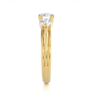 Side profile of 2 Carat 3 Stone Round Cut Moissanite Ring in Yellow Gold, highlighting the prong setting.