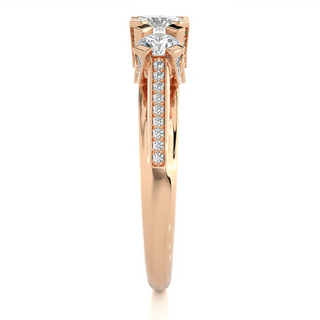 Side profile of 2 Ct Moissanite Three Stone Engagement Ring with Accent in Rose Gold, highlighting the prong setting.