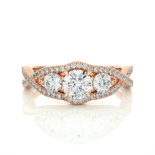 Front view of 2 Carat Round Moissanite Three Stone Twisted Engagement Ring in Rose Gold, highlighting the brilliant center Moissanite stone.