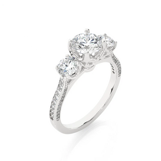 Angled view of 2 Carat Round Moissanite Filigree Three Stone Engagement Ring in White Gold, showcasing the band and setting.​