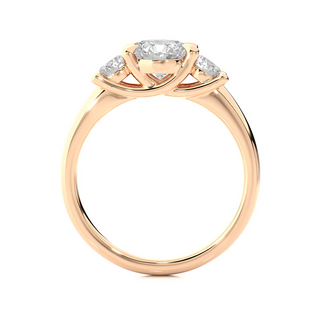 Side profile of 2 Carat Round Moissanite Three Stone Engagement Ring in Rose Gold, highlighting the prong setting.