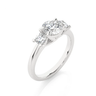 Angled view of 2 Carat Round Moissanite Three Stone Engagement Ring in Silver, showcasing the band and setting.​