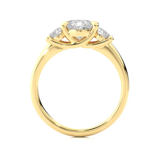Side profile of 2 Carat Round Moissanite Three Stone Engagement Ring In Yellow Gold, highlighting the prong setting.
