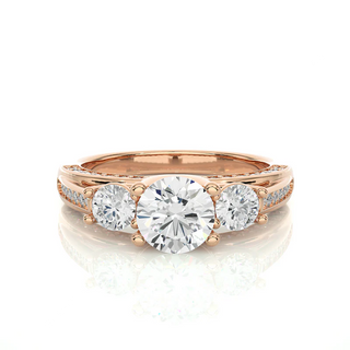 Front view of 2 Carat Moissanite Three Stone Engagement Ring With Accents in Rose Gold, highlighting the brilliant center moissanite stone.