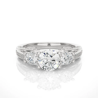 Front view of 2 Ct Moissanite Three Stone Engagement Ring With Accents in White Gold, highlighting the brilliant center moissanite stone.