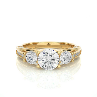 Front view of 2 Carat Moissanite Three Stone Engagement Ring With Accents in Yellow Gold, highlighting the brilliant center moissanite stone.