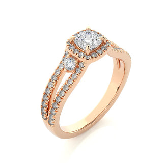 Angled view of 2 Ct Three Stone Cushion Cut Moissanite Halo Ring in Rose Gold, showcasing the band and setting.​