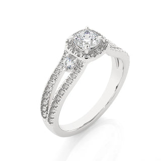 Angled view of 2 Carat Cushion Cut Moissanite Three Stone Halo Ring in Silver, showcasing the band and setting.​