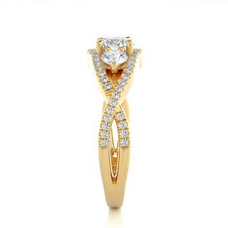 Side profile of 2 Carat Round Shaped Moissanite Three Stone Twisted Engagement Ring in Yellow Gold, highlighting the brilliant center moissanite stone., highlighting the prong setting.