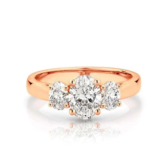 2 Carat Oval Cut Three Stone Moissanite Engagement Ring in Rose Gold