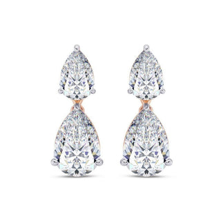 7 Carat Pair Pear Shaped Moissanite Drop Earrings In Rose Gold