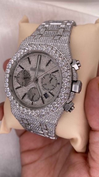 Luxury AP-style moissanite watch for men in angled view, featuring iced-out bezel, chronograph dials, and pavé diamond bracelet.