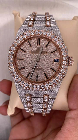 Iced out AP Moissanite Watch with rose gold accents, shimmering moissanite stones, stainless steel strap, and date display.