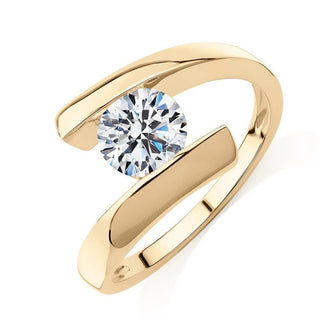 Tension Set Round Cut Moissanite Solitaire Engagement Ring In Yellow Gold