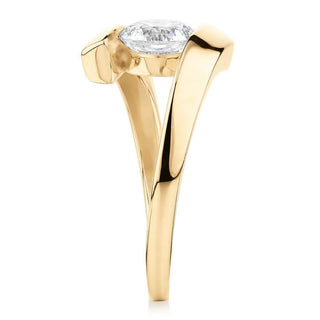 Tension Set Round Cut Moissanite Solitaire Engagement Ring In Yellow Gold