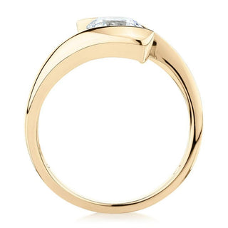 Tension Set Round Cut Moissanite Solitaire Engagement Ring In Yellow Gold
