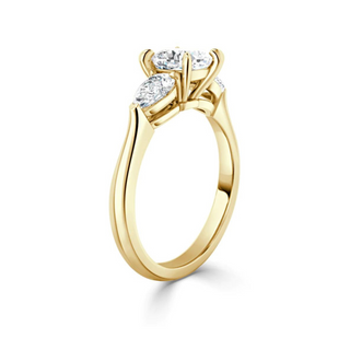 2.5 Carat Moissanite Cushion Three Stone Ring in Yellow Gold