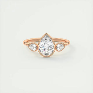 2 Carat Pear Cut Three Stone Bezel Set Moissanite Ring in Rose Gold