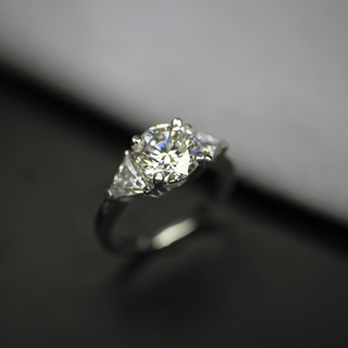 3 Carat Round And Trillion Cut Moissanite Three Stone Ring