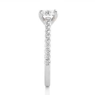 Side profile of 1.20 Ct Round Cut Moissanite Cathedral Set Engagement Ring In Silver, highlighting the brilliant center moissanite stone., highlighting the prong setting.