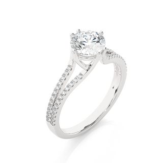 Angled view of 1.40 Ct Round Cut Moissanite Split Shank Engagement Ring In Silver, showcasing the band and setting.​
