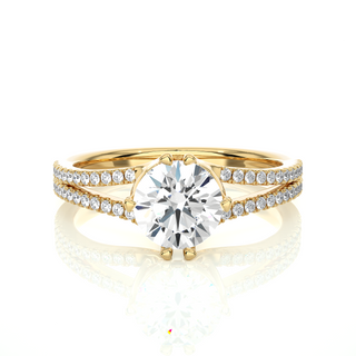 Front view of 1.40 Ct Round Cut Moissanite Split Shank Engagement Ring In Yellow Gold, highlighting the brilliant center moissanite stone.