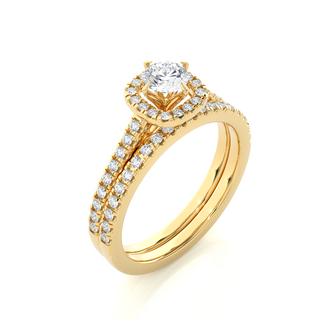 Angled view of 1.50 Carat Halo Moissanite Bridal Set With Accents in Yellow Gold, showcasing the band and setting.​