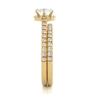 Side profile of 1.50 Carat Halo Moissanite Bridal Set With Accents in Yellow Gold, highlighting the brilliant center moissanite stone., highlighting the prong setting.