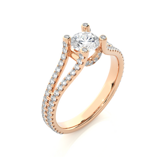 Angled view of 1.50 Carat Moissanite Split Shank Engagement Ring With Accents In Rose Gold, showcasing the band and setting.​