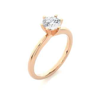Angled view of 1.50 Carat Round Cut Moissanite Solitaire Engagement Ring In Rose Gold, showcasing the band and setting.​