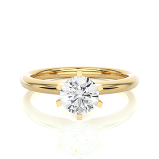 Front view of 1.50 Carat Round Cut Moissanite Solitaire Engagement Ring In Yellow Gold, highlighting the brilliant center moissanite stone.