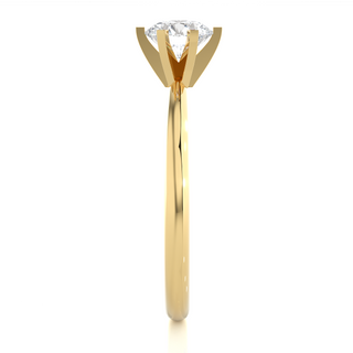 Side profile of 1.50 Carat Round Cut Moissanite Solitaire Engagement Ring In Yellow Gold, highlighting the prong setting.