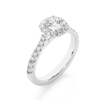 Angled view of 1.50 Carat Round Moissanite Halo Engagement Ring In White Gold, showcasing the band and setting.​