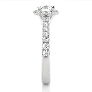 Side profile of 1.50 Carat Round Moissanite Halo Engagement Ring In White Gold, highlighting the brilliant center moissanite stone., highlighting the prong setting.