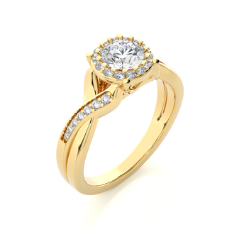 Angled view of 1.50 Carat Round Moissanite Halo Twisted Ring In Yellow Gold, showcasing the band and setting.​
