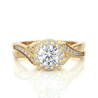 Front view of 1.50 Carat Round Moissanite Halo Twisted Ring In Yellow Gold, highlighting the brilliant center Moissanite stone.