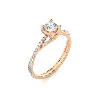 Angled view of 1.50 Carat Round Moissanite Twisted Solitaire Ring In Rose Gold, showcasing the band and setting.​