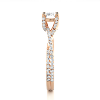 Side profile of 1.50 Carat Round Moissanite Twisted Solitaire Ring In Rose Gold, highlighting the prong setting.
