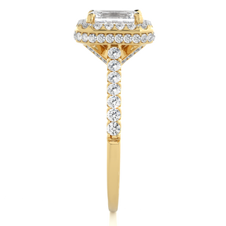 Side profile of 1.50 Ct Emerald Cut Moissanite Halo Engagement Ring In Yellow Gold, highlighting the prong setting.