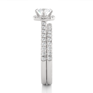 Side profile of 1.50 Ct Halo Moissanite Bridal Set With Accents in White Gold, highlighting the brilliant center moissanite stone., highlighting the prong setting.